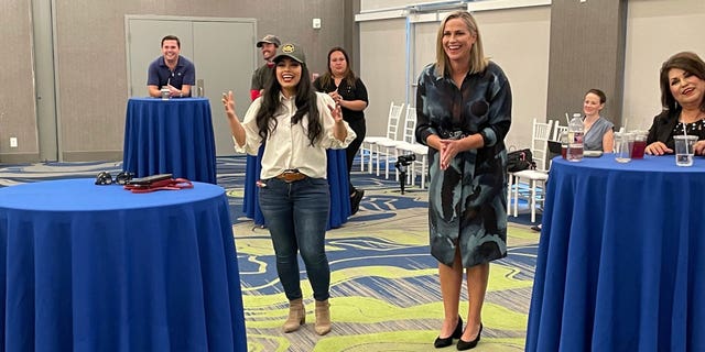 Washington Republican Senate nominee Tiffany Smiley, right, stands alongside Rep. Mayra Flores, R-Texas, during a meeting with border patrol agents and their families in McAllen, Texas, on Aug. 30, 2022.