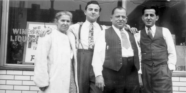 Mary Palermo (far left) and Paul Palermo (second from right, in open vest) were immigrants from Sicily who got into the bar business in St. Louis. They're pictured with sons Jimmy (second from left) and Joe (far right). Jimmy turned Palermo's into what some say is America's first sports bar.