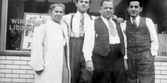 Mary Palermo (far left) and Paul Palermo (second from right, in open vest) were immigrants from Sicily who got into the bar business in St. Louis. They're pictured with sons Jimmy (second from left) and Joe (far right). Jimmy turned Palermo's into what some say is America's first sports bar.