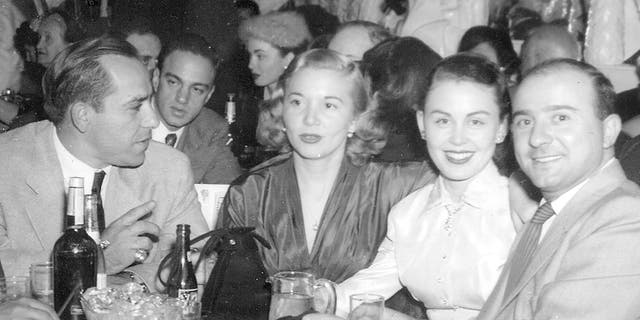 Jim Palermo (right) was a brother-in-law of Yankees legend Yogi Berra (far left). Their wives, Carmen Short Berra and Nadine Short Palermo, were sisters. This image was taken during a Tony Bennett performance at the Copacabana in New York City in the fall of 1952.