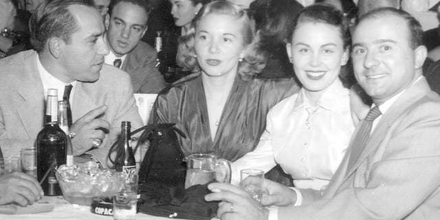 Jim Palermo (right) was a brother-in-law of Yankees legend Yogi Berra (far left). Their wives, Carmen Short Berra and Nadine Short Palermo, were sisters. This image was taken during a Tony Bennett performance at the Copacabana in New York City in the fall of 1952.