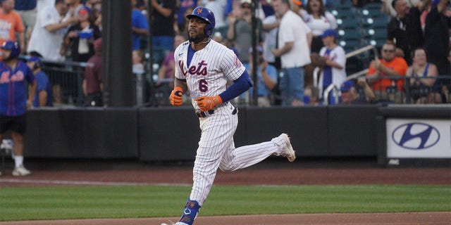 New York Mets' Starling Marte runs the bases after his home run in the first inning during a baseball game against the Cincinnati Reds, Monday, Aug. 8, 2022, in New York.