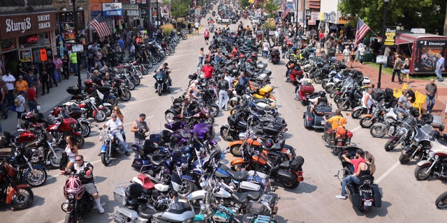 Motorcycle enthusiasts attend the 81st annual Sturgis Motorcycle Rally on August 8, 2021, in Sturgis, South Dakota.