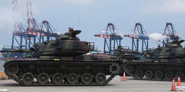 DOSSIER - Les forces militaires de Taïwan mènent des exercices anti-débarquement lors des exercices militaires annuels de Han Kuang près de la ville de New Taipei, à Taïwan, le 27 juillet 2022.