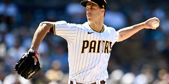 Padres' Taylor Rogers throws against the Seattle Mariners, July 5, 2022, at Petco Park in San Diego, California.