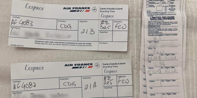 The tickets for one family (shown here) are proof of their handwritten boarding passes after machines were down upon their arrival at the airport.