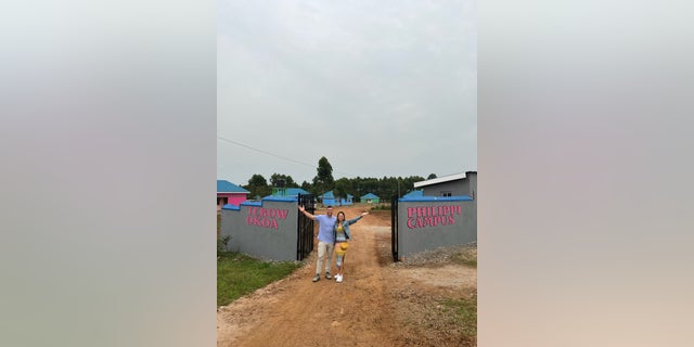 Tim and Demi Tebow at a home for battered women in Uganda. The home opened in February 2022.