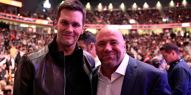 Tom Brady poses for a photo with UFC President Dana White during UFC 246 at T-Mobile Arena in Las Vegas on January 18, 2020.