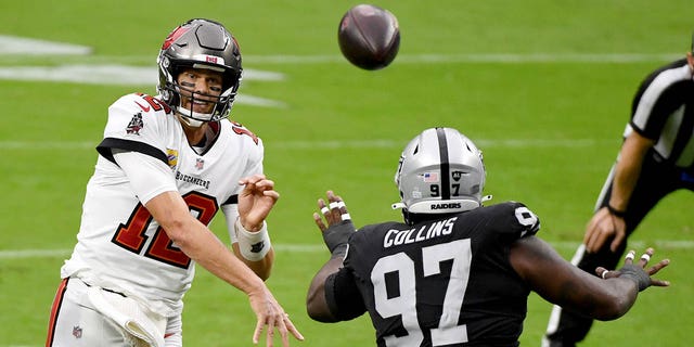 Quarterback Tom Brady of the Tampa Bay Buccaneers throws against the Raiders at Allegiant Stadium on Oct. 25, 2020, in Las Vegas, Nevada.