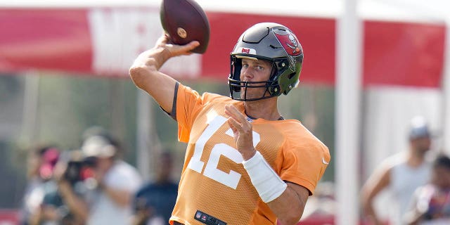 Tampa Bay Buccaneers quarterback Tom Brady throws during practice on Aug. 10, 2022, in Tampa, Florida.