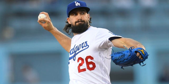 Los Angeles Dodgers starting pitcher Tony Gonsolin (26) pitches against the Washington Nationals in the second inning at Dodger Stadium on July 25, 2022 in Los Angeles, CA.