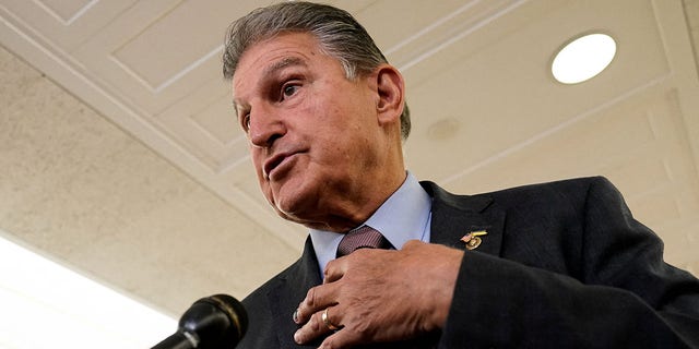 Sen. Joe Manchin, D-W.Va., speaks to reporters outside a U.S. Senate Energy and Natural Resources Committee hearing on Capitol Hill in Washington July 19, 2022. 