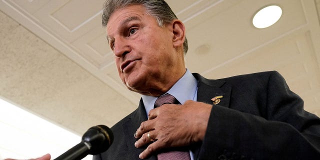 Sen. Joe Manchin, D-W.Va., speaks to reporters outside a U.S. Senate Energy and Natural Resources Committee hearing on Capitol Hill in Washington July 19, 2022. 