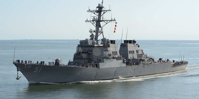 The guided-missile destroyer USS Arleigh Burke transits the Chesapeake Bay on its way back into port. 