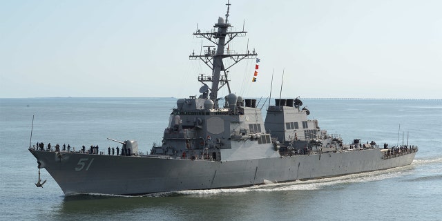 The guided-missile destroyer USS Arleigh Burke transits the Chesapeake Bay on its way back into port. 