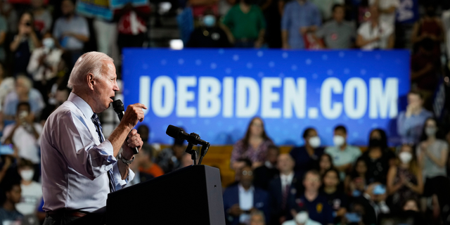 President Joe Biden speaks at a rally hosted by the Democratic National Committee.