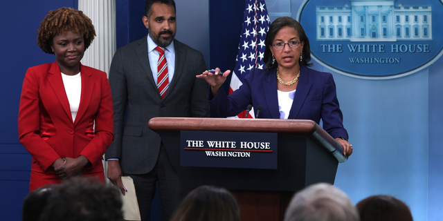 White House Domestic Policy Adviser Susan Rice (R) speaks on President Biden's announcement of student loan debt forgiveness as White House Press Secretary Karine Jean-Pierre (L) and Deputy Director of the National Economic Council Bharat Ramamurti (2nd L) listen during a White House House daily press briefing.