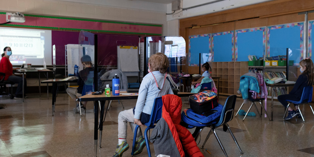 Students return to school after COVID-19 restrictions are lifted in Philadelphia, Pennsylvania.