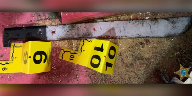 When four of the deputies went into the apartment unit, the suspect sliced one of the deputies with the machete in the hand and caused a severe injury, according to the sheriff's office.