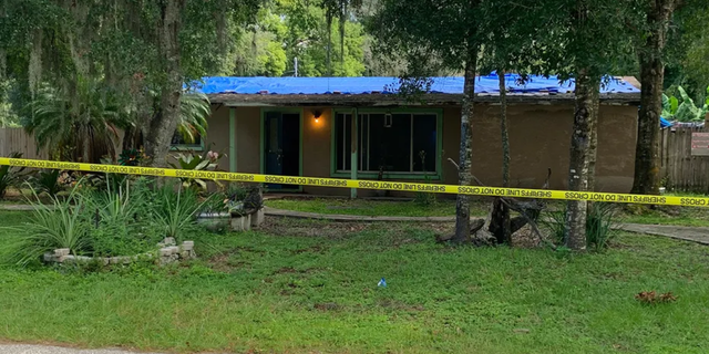 A Florida man was killed after he allegedly broke into a house and got into bed with the homeowner, all while carrying a machete.