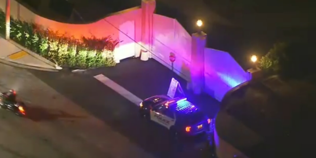 Aerial footage of police stationed outside of Mar-a-Lago during FBI raid.