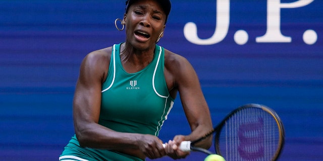Venus Williams returns a shot to Alison Van Uytvanck of Belgium during the first round of the U.S. Open in New York on Aug. 30, 2022.