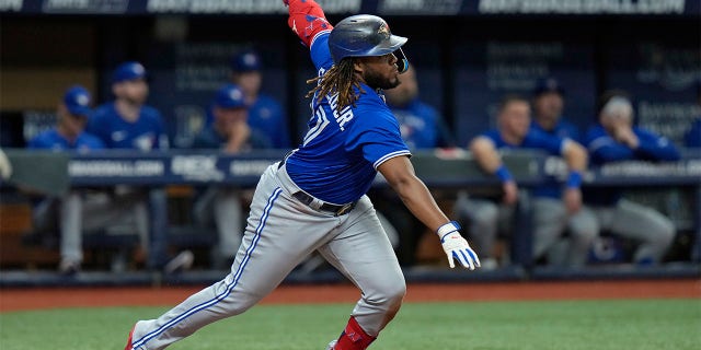 Toronto Blue Jays' Vladimir Guerrero Jr. singles off Tampa Bay Rays starting pitcher Drew Rasmussen during the third inning on Tuesday, Aug. 2, 2022, in St. Petersburg, Fla.