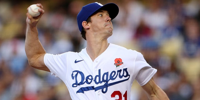 Walker Buehler of the Los Angeles Dodgers pitches against the Pittsburgh Pirates at Dodger Stadium on May 30, 2022, in Los Angeles, California.