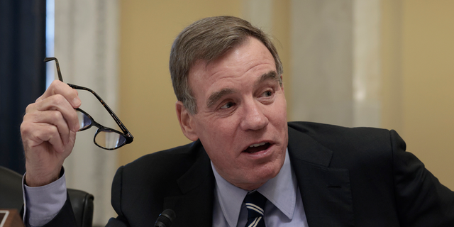 Sen. Mark Warner, D-Va., speaks during an oversight hearing, Dec. 7, 2021, in Washington.