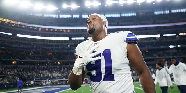 Carlos Watkins of the Dallas Cowboys walks off the field after a game against the New York Giants in Arlington, Texas, on Oct. 10, 2021.