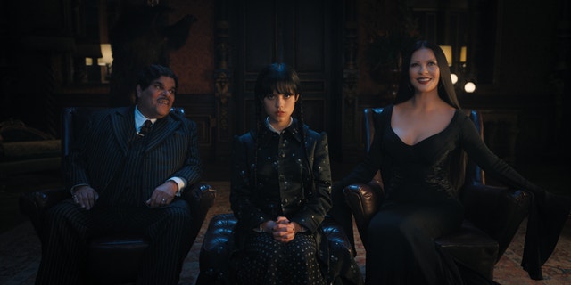Luis Guzmán stars Gomez Addams, Jenna Ortega as Wednesday Addams and Catherine Zeta-Jones as Morticia Adams in Netlfix's upcoming spin-off series "Wednesday."