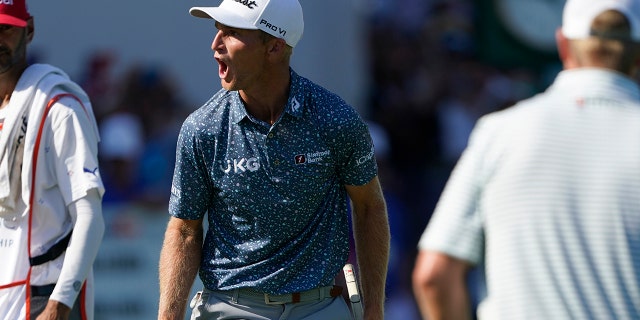 Will Zaratris celebrates after making a putt on the 18th green during the final round of the St. Jude Championship Golf Tournament on Sunday, August 14, 2022 in Memphis, Tennessee.