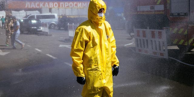 A Ukrainian Emergency Ministry rescuer attends an exercise in the city of Zaporizhzhia on August 17, 2022, in case of a possible nuclear incident at the Zaporizhzhia nuclear power plant located near the city.