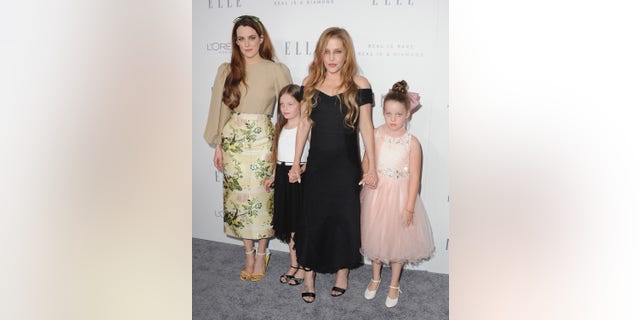 Lisa Marie Presley credits her daughters with helping her push past the indescribable loss of her only son.