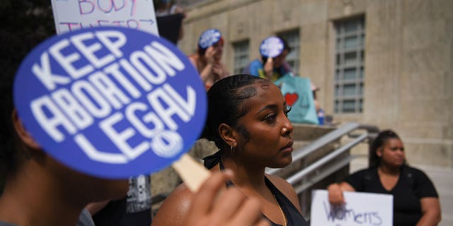  Abortion rights protesters participate in nationwide demonstrations following the leaked Supreme Court opinion suggesting the possibility of overturning the Roe v. Wade abortion rights decision, in Houston, Texas, U.S., May 14, 2022. 