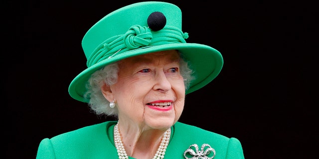 Queen Elizabeth II stands on the balcony of Buckingham Palace following the Platinum Pageant on June 5 in London.