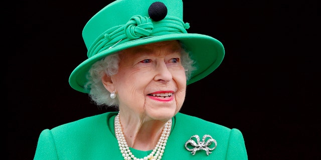 Queen Elizabeth II stands on the balcony of Buckingham Palace following the Platinum Pageant on June 5 in London.