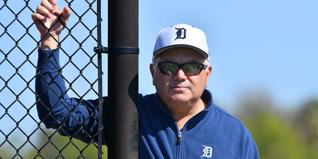 Al Avila, Detroit Tigers executive vice president of baseball operations and general manager, watches spring training workouts on February 14, 2019 at Tigertown Complex in Lakeland, Florida.