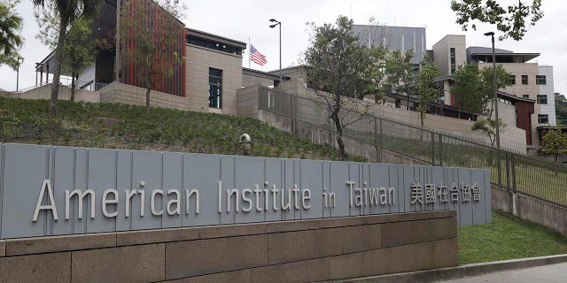 U.S. flag flies at American Institute in Taiwan, or AIT in Taipei, Taiwan, Wednesday, Nov. 10, 2021. (AP Photo/Chiang Ying-ying, File)