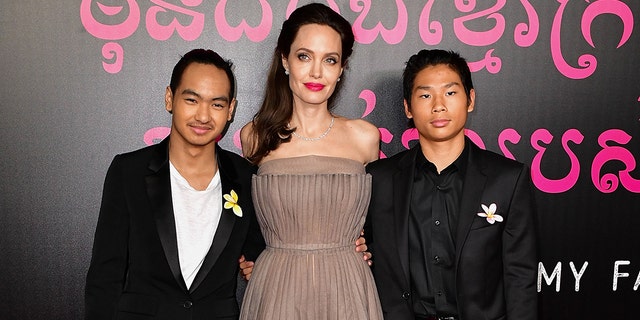 "Salt" actress Angelina Jolie says her sons Maddox, 21, and Pax, 18, worked with her on the Italian movie set of "Without Blood."