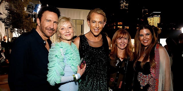 Anne Heche joins friends at the Gen Art x equalshuman show in 2021, from left to right: Peter Thomas Roth, Anne Heche, Derek Warburton, Nicole Miller and Heather Duffy.