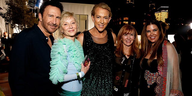 Anne Heche joins friends at the Gen Art x equalshuman show in 2021, from left to right: Peter Thomas Roth, Anne Heche, Derek Warburton, Nicole Miller and Heather Duffy.