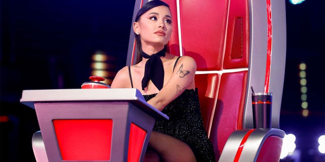 Before filming "Wicked," Ariana Grande joined the cast of the competition singing show, "The Voice" as a coach.