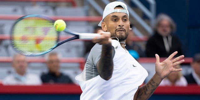 Nick Kyrgios, of Australia, returns to Sebastian Baez, of Argentina, during first round play at the National Bank Open tennis tournament Tuesday Aug. 9, 2022, in Montreal. 