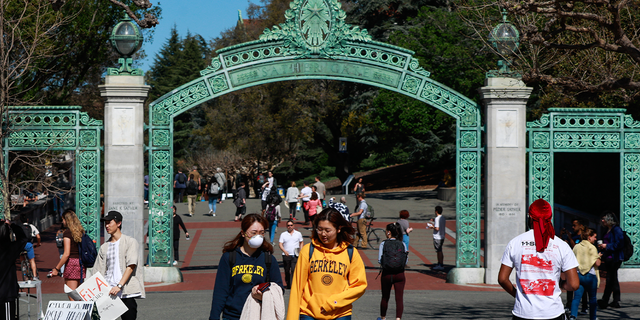 Student wears a mask while on the UC Berkeley campus on Wednesday, March 4, 2020, in Berkeley, California. 