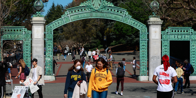 Student wears a mask while on the UC Berkeley campus on Wednesday, March 4, 2020, in Berkeley, California.