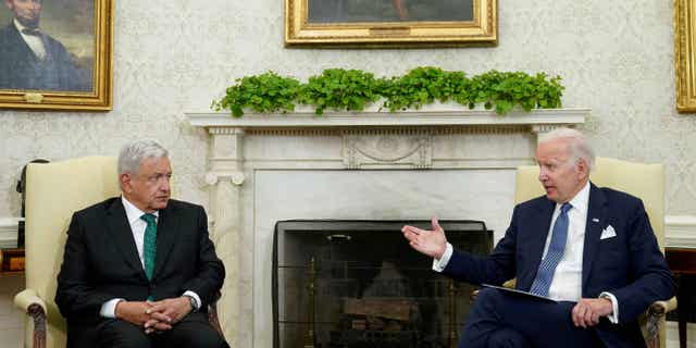 President Joe Biden sits down with Mexican President Andres Manuel Lopez Obrador in the Oval Office of the White House in Washington, U.S., on July 12, 2022.
