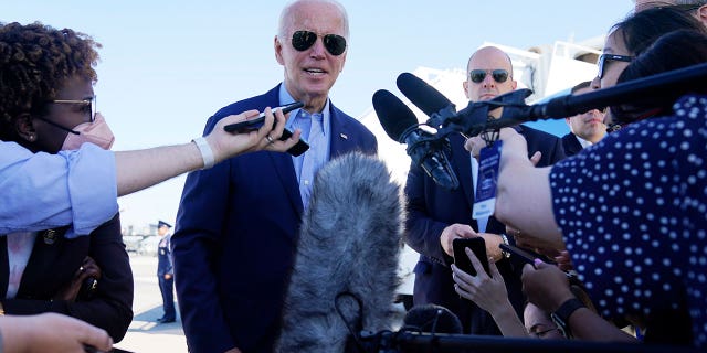 President Joe Biden speaks to the media before boarding Air Force One for a trip to Kentucky to view flood damage, Monday, Aug. 8, 2022, in Dover Air Force Base, Del.