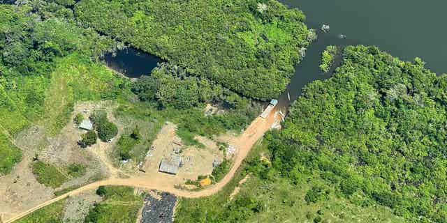 An illegal road inside a protected area called Terra do Meio Ecological Station in Para state, in the Brazilian Amazon, pictured here on May 2, 2022, has come under scrutiny from environmentalists who claim the road will lead to further deforestation by making the surrounding forests more accessible.