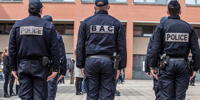 Police officers in the courtyard of the central police station in Toulouse, France.